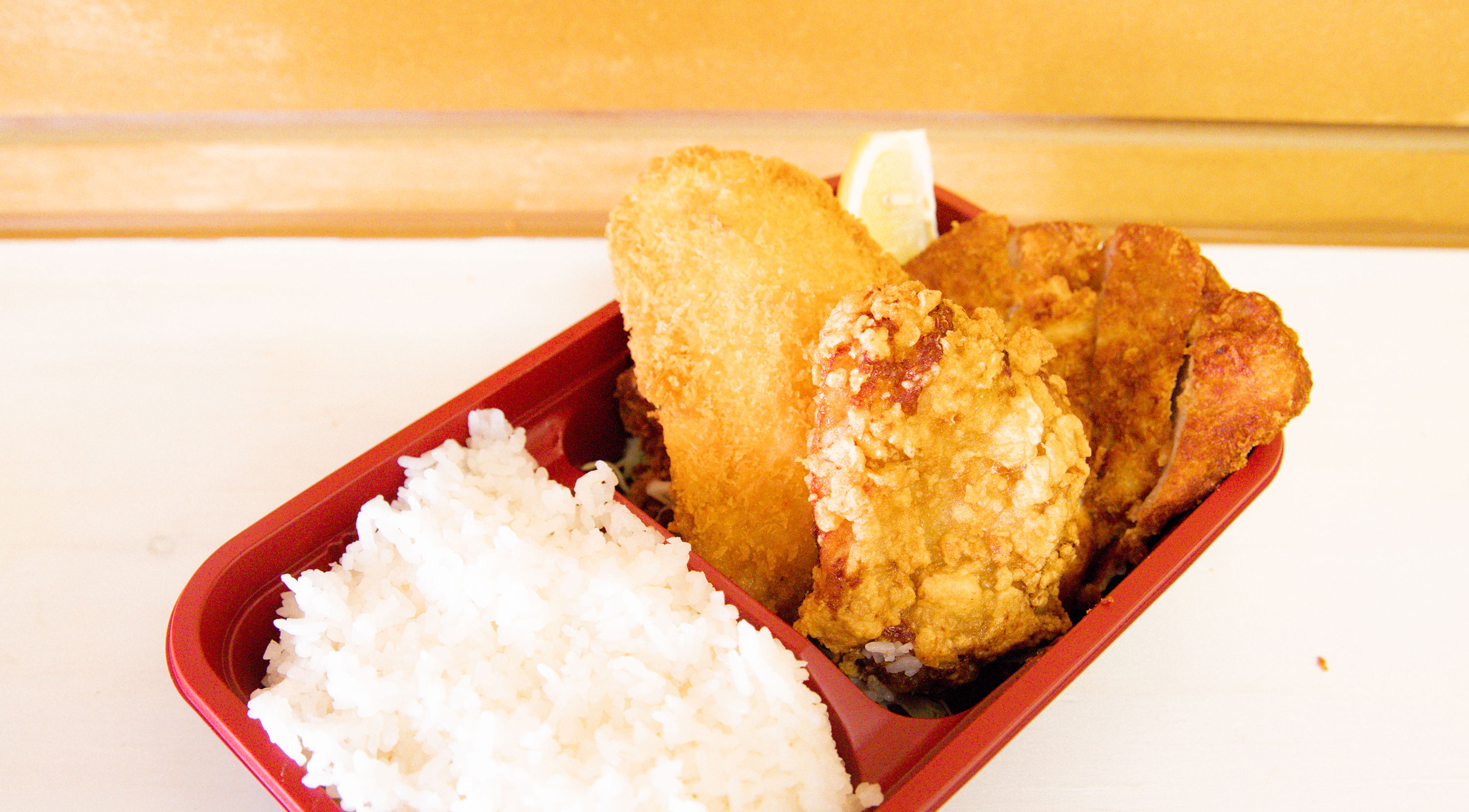 Mix Fry Bento Karaage, Tonkatsu and Fried Hoki comes with rice